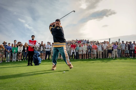 Happy Gilmore 2. (L to R) Benito Antonio Martínez Ocasio as Busboy and Adam Sandler as Happy Gilmore in Happy Gilmore 2. Netflix